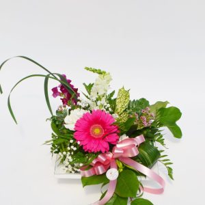 Arrangement de fleurs rose doux
